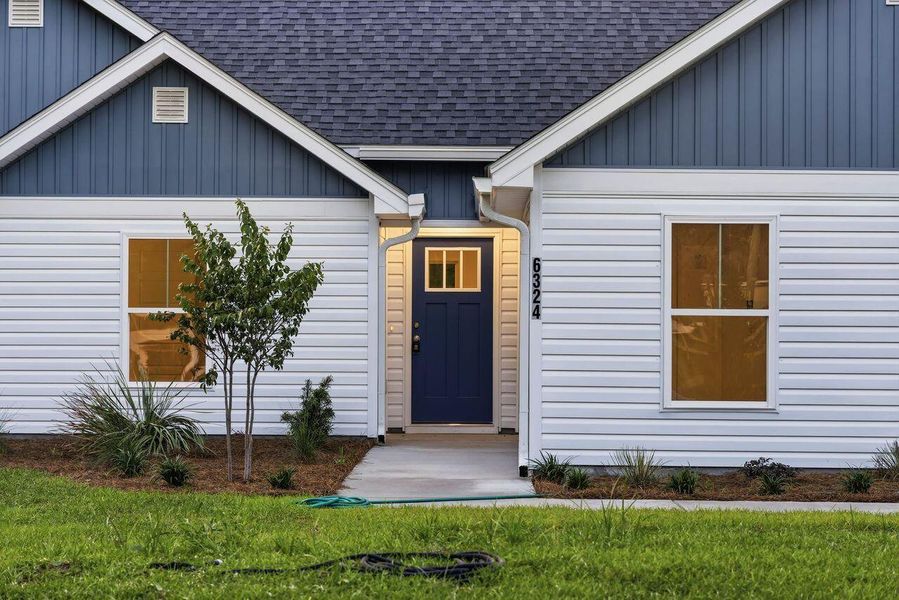 Exterior details and patio area of a home in , Awendaw (Image 31).