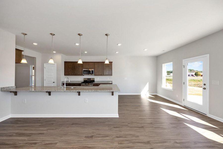 The Avery- Family Room. Home under construction. Sample floor plan photo used for illustrative purposes only. Upgrades, selections options, and colors will vary.