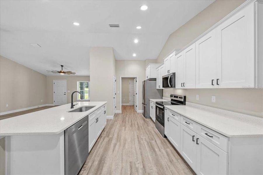 Furnished interior view inside a new home in , Dunnellon (Image 9).
