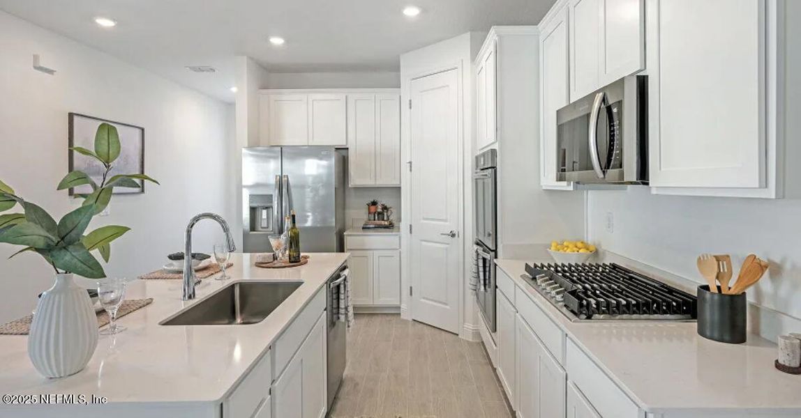 Furnished interior view inside a new home in Granary Park, Green Cove Springs (Image 19).