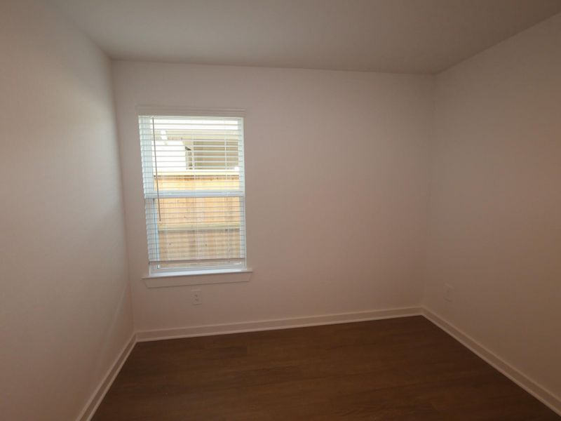 Spacious, unfurnished interior of a new home in Pinewood at Grand Texas, New Caney (Image 21).