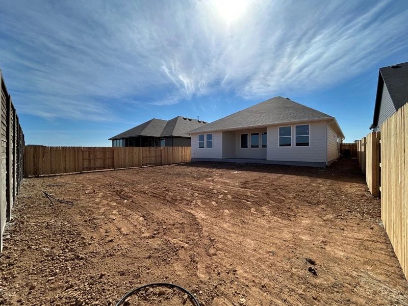 Exterior details and patio area of a home in Willow Springs, Buda (Image 15).
