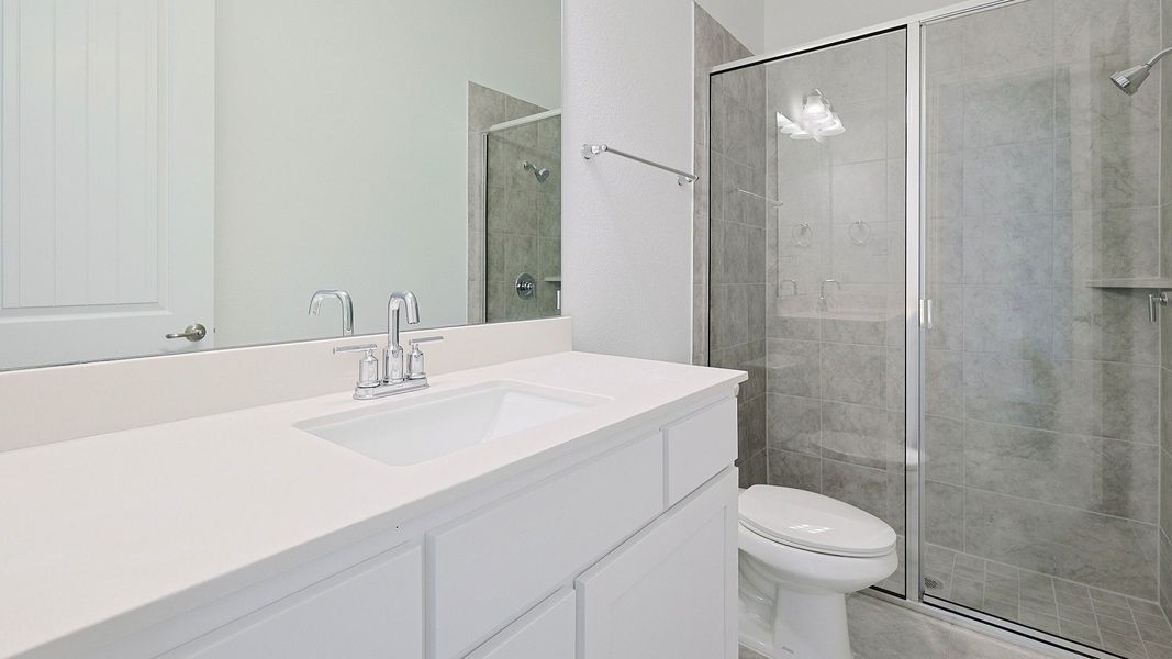 Representative furnished interior of a home built from the Villanova by Brightland Homes in Katy Lakes, Katy (Image 15).