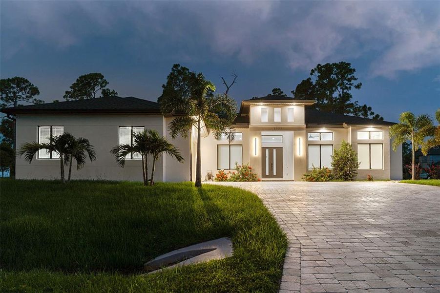 Front exterior of a new home in , North Port, FL, highlighting curb appeal (Image 23).