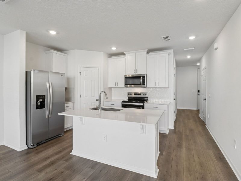 Furnished interior view inside a new home in Cagan Crossings West, Clermont (Image 5).