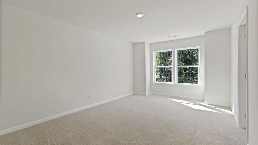 Spacious, unfurnished interior of a new home in Copper Run South, Durham (Image 16).