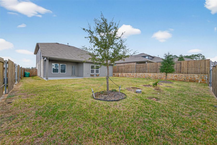 Exterior details and patio area of a home in Water Crest on Lake Conroe, Conroe (Image 33).