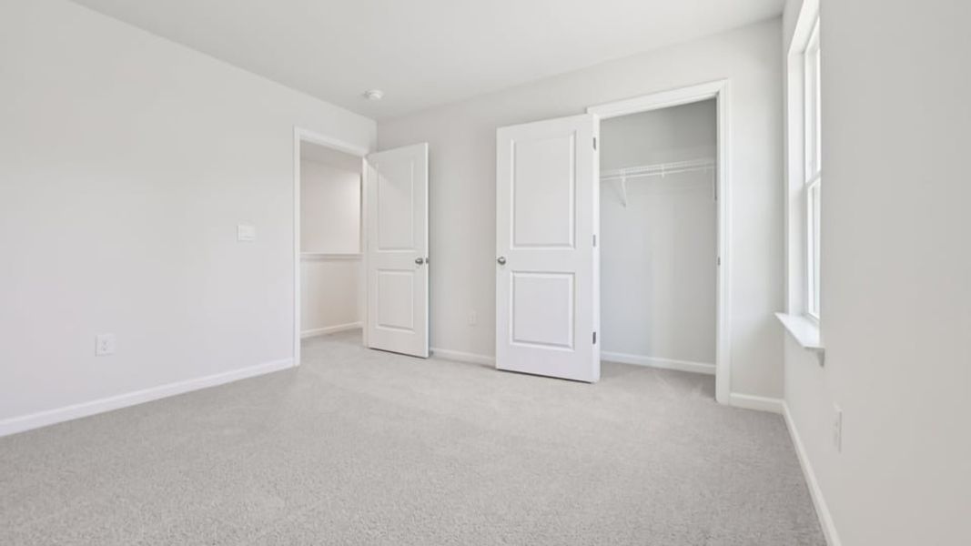Spacious, unfurnished interior of a new home in Gretchen Pines, West End (Image 20).