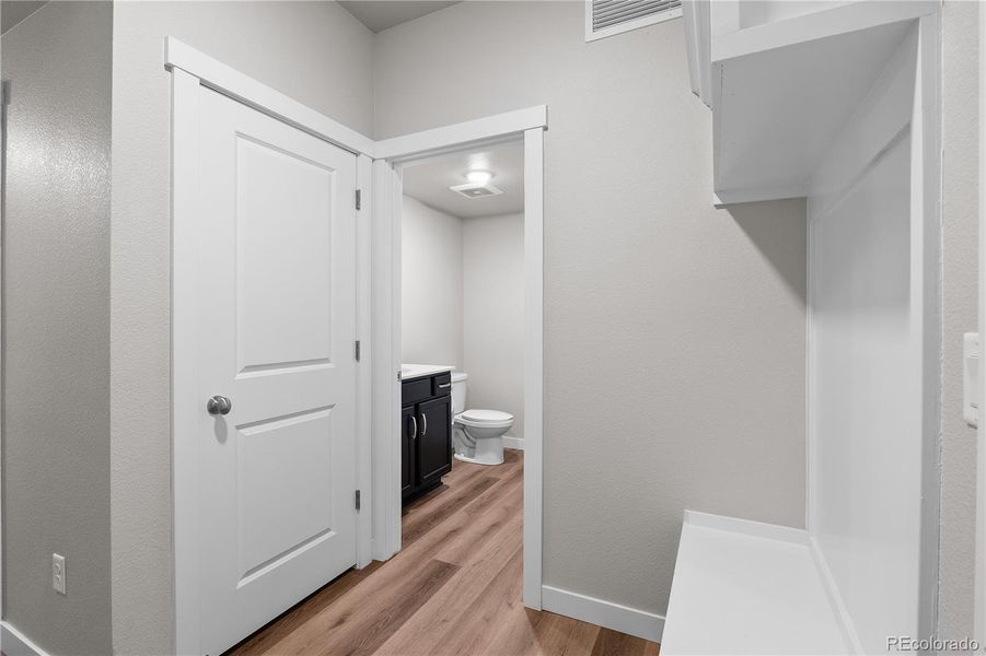 mud room + half bathroom/main level