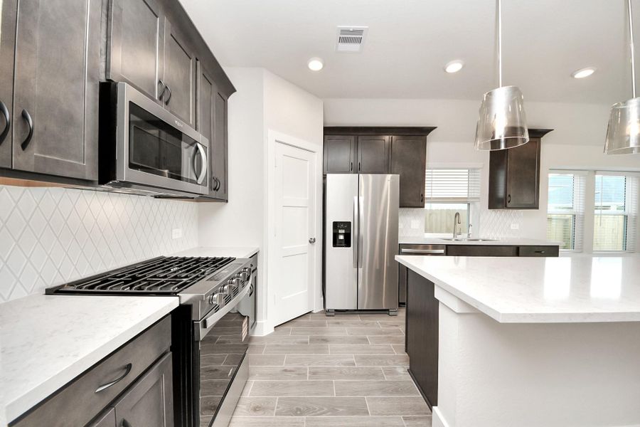Furnished interior view inside a new home in Laurel Landing: Landmark Collection, Alvin (Image 13).