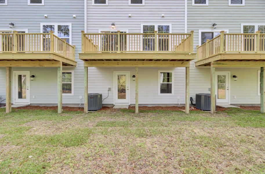 Exterior details and patio area of a home in , Johns Island (Image 29).