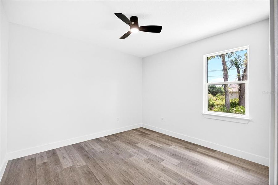 Spacious, unfurnished interior of a new home in , Port Charlotte (Image 18).
