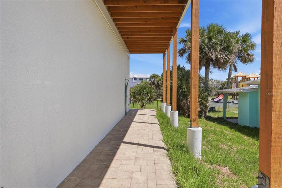 Exterior details and patio area of a home in , New Smyrna Beach (Image 31).