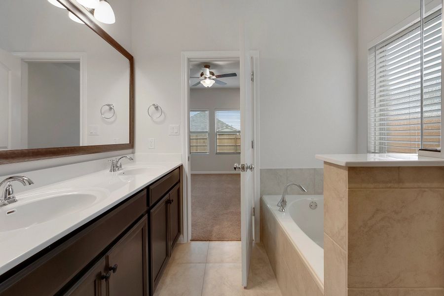 Representative furnished interior of a home built from the Cambridge by Ashton Woods in Lagos Reserve, Manor (Image 12). Representative furnished interior of a home built from the Cambridge by Ashton Woods in Lagos Reserve, Manor (Image 12).