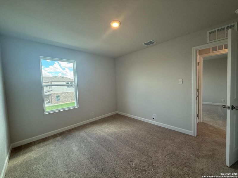 Spacious, unfurnished interior of a new home in The Summit at Saddlebrook Ranch 55's, Schertz (Image 19).