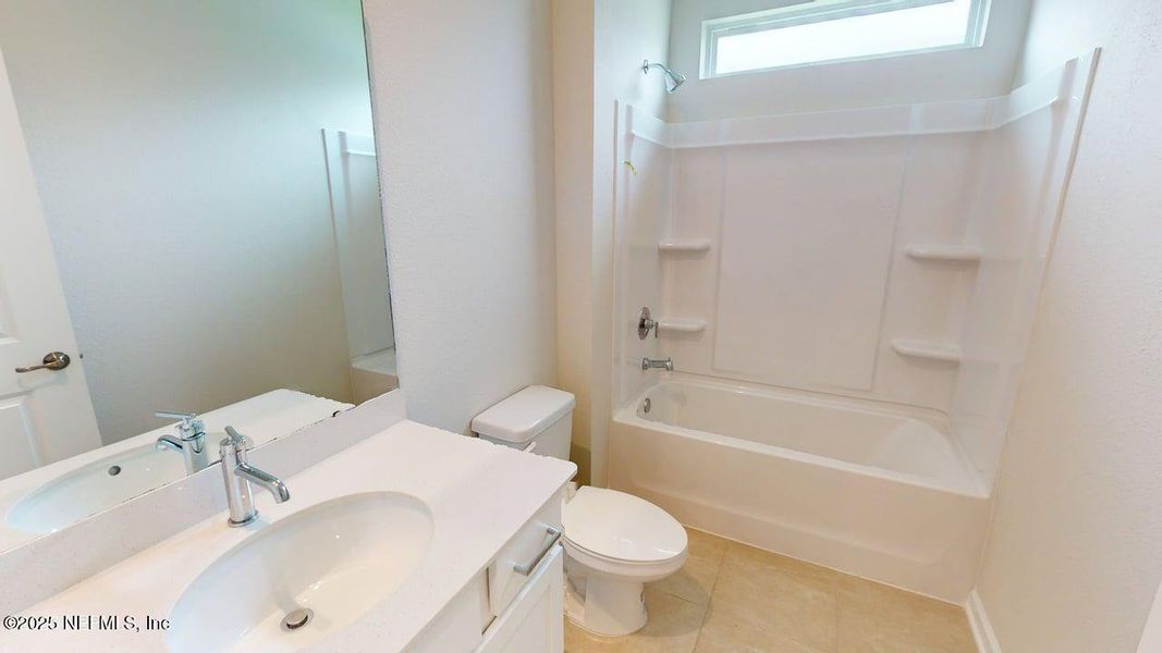 Furnished interior view inside a new home in Lakes at Bella Lago, Green Cove Springs (Image 10).