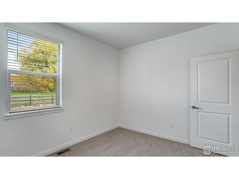 Spacious, unfurnished interior of a new home in Hansen Farm, Fort Collins (Image 24).