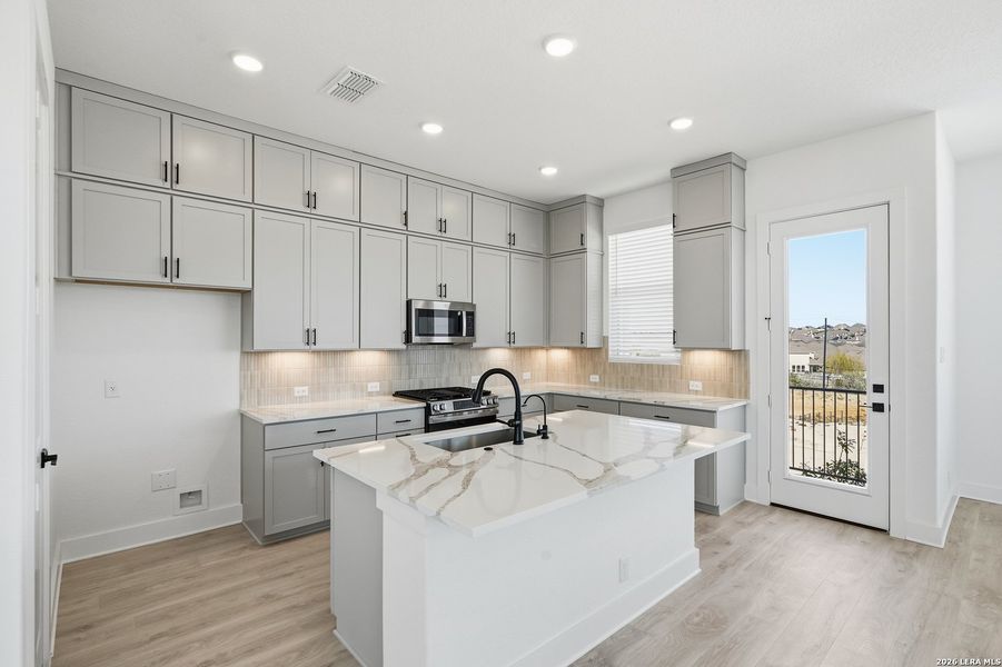 Furnished interior view inside a new home in Prominence, San Antonio (Image 10).