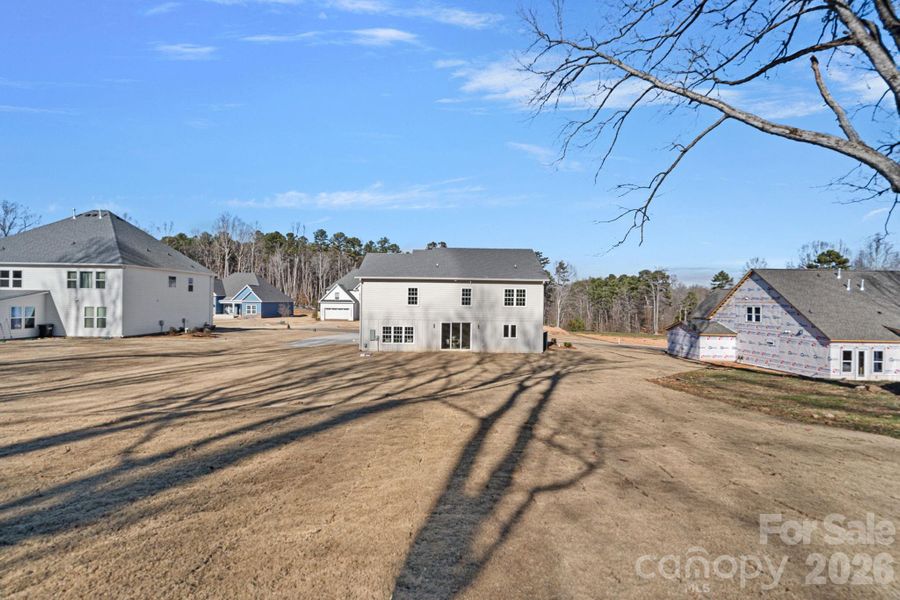 Located on a dead end cul-de-sac in Serenity Woods, an intimate 12-home enclave offering quiet surroundings with convenient access to Charlotte.