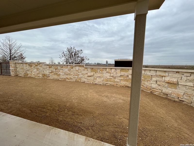 Exterior details and patio area of a home in Meadows at Hennersby Hollow 40's, San Antonio (Image 2). Exterior details and patio area of a home in Meadows at Hennersby Hollow 40's, San Antonio (Image 2).