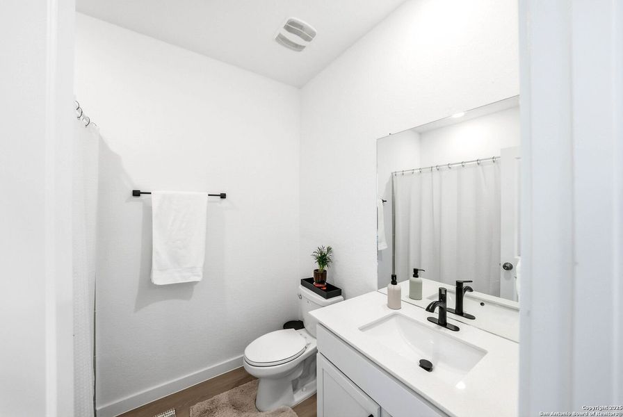 Furnished interior view inside a new home in Hidden Trails: Coastline Collection, Bulverde (Image 13).