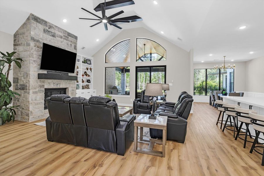 Spacious living room with vaulted ceilings and wood beams