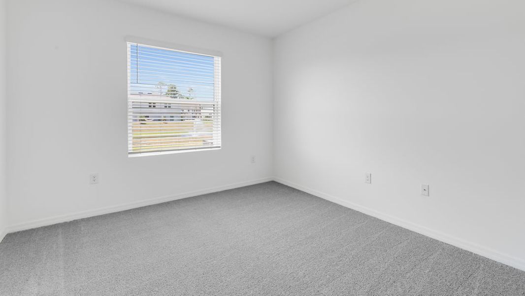 Representative unfurnished interior of a home built from the Ambrosia by Taylor Morrison in Aden South at Westview, Kissimmee (Image 17).