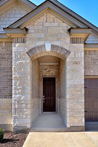 Exterior details and patio area of a home in Salerno - Classic Collection, Round Rock (Image 21). Exterior details and patio area of a home in Salerno - Classic Collection, Round Rock (Image 21).