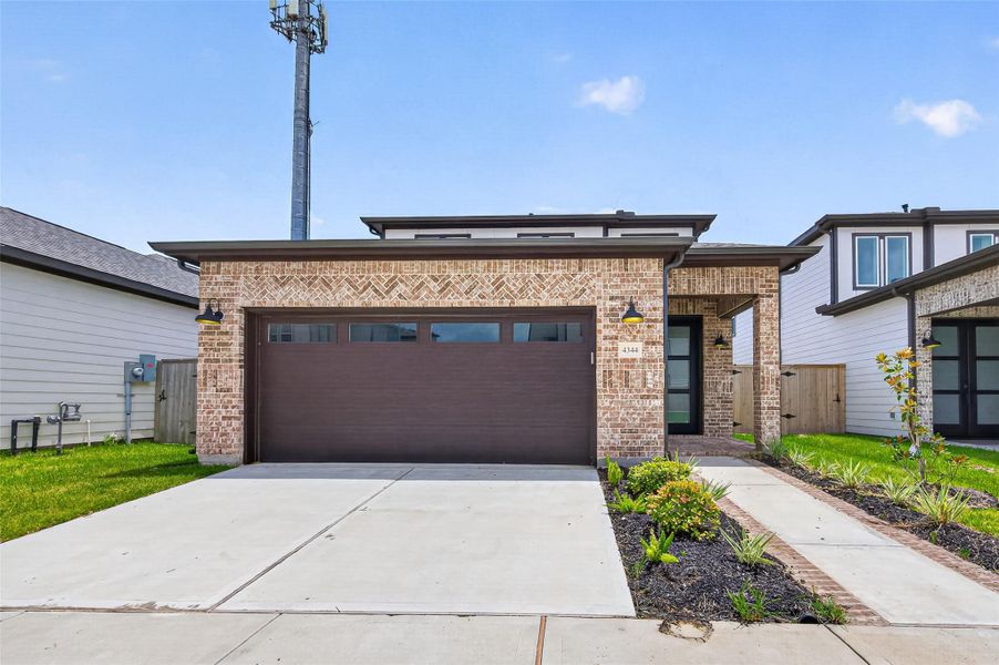 Front exterior of a new home in , Stafford, TX, highlighting curb appeal (Image 27). Front exterior of a new home in , Stafford, TX, highlighting curb appeal (Image 27).