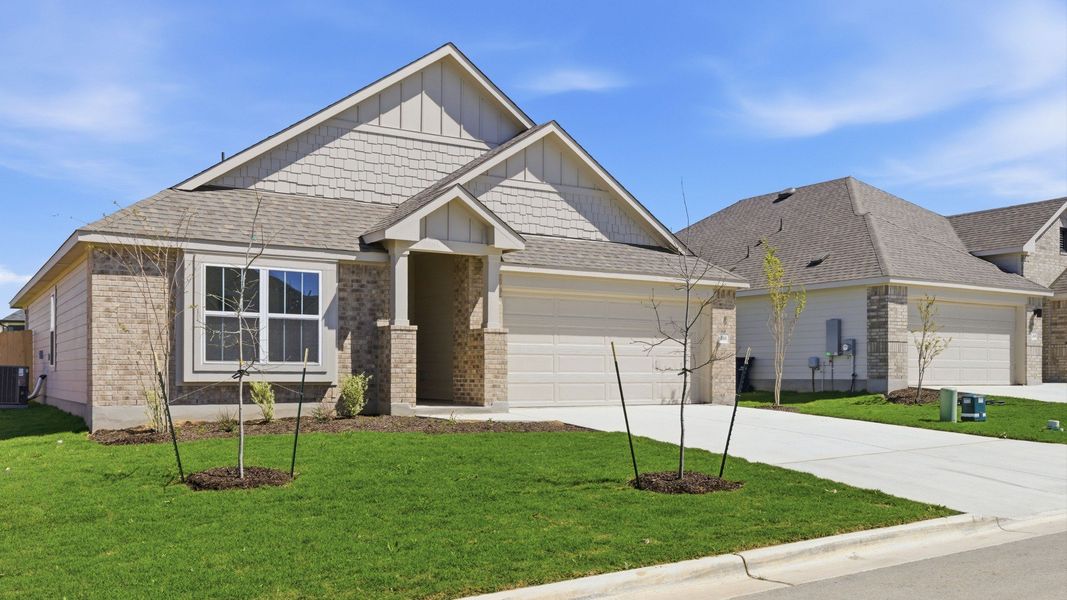 Representative exterior photo of a completed home built from the Avalon by DRB Homes in Sky Ridge, San Marcos, TX (Image 21). Representative exterior photo of a completed home built from the Avalon by DRB Homes in Sky Ridge, San Marcos, TX (Image 21).