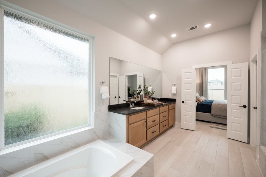 Representative furnished interior of a home built from the Falcon by Tri Pointe Homes in Pecan Ridge, Fulshear (Image 20).