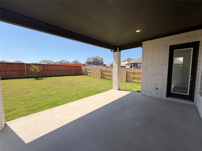 Exterior details and patio area of a home in Lariat, Liberty Hill (Image 3).