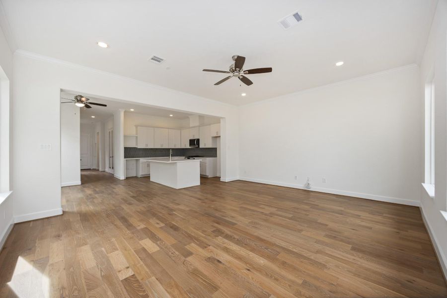 Whether you’re watching the big game or curling up with a good book, this spacious living room gives you the flexibility to make it your own.