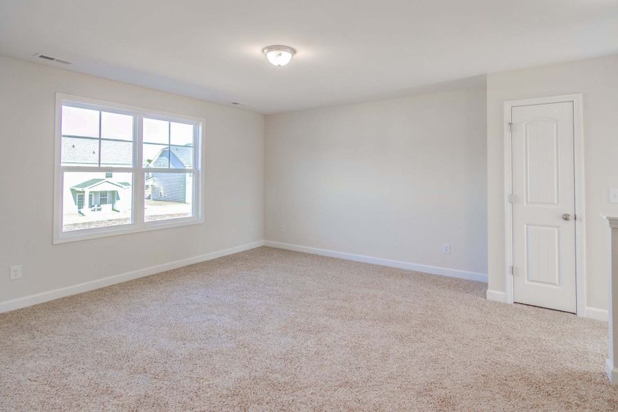 Representative unfurnished interior of a home built from the Drayton by Caviness & Cates Communities in Bartlett Manor, Youngsville (Image 200).