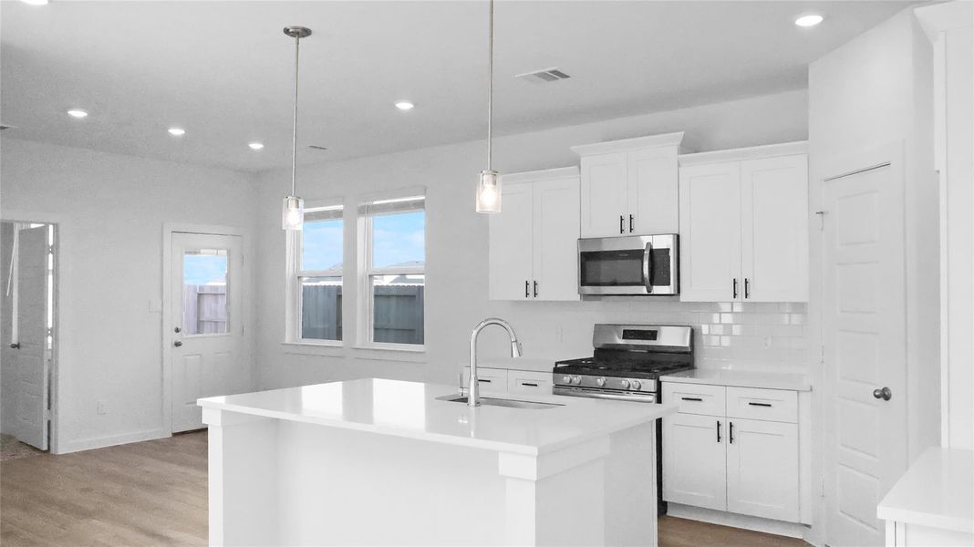 Kitchen, Quartz countertops, tiled backsplash