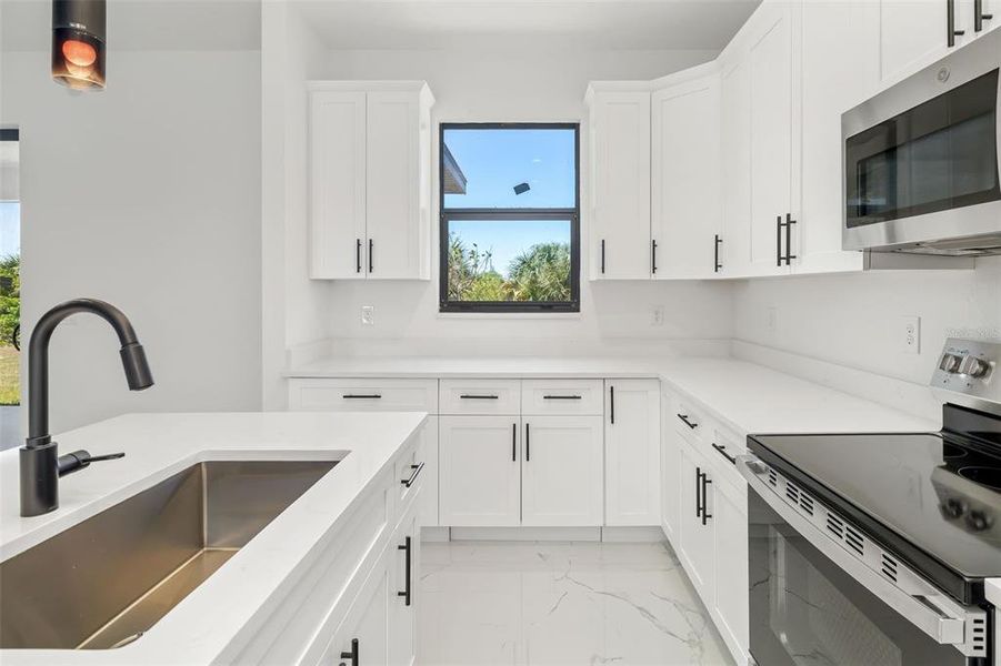Furnished interior view inside a new home in , Port Charlotte (Image 13).