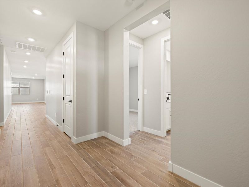 Spacious, unfurnished interior of a new home in White Tank Foothills Reserve Series, Waddell (Image 8).