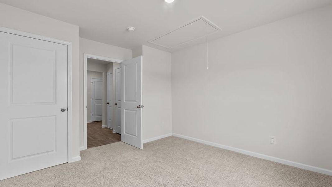 Representative unfurnished interior of a home built from the Cali by D.R. Horton in Hobbs Farm, Ayden (Image 21).