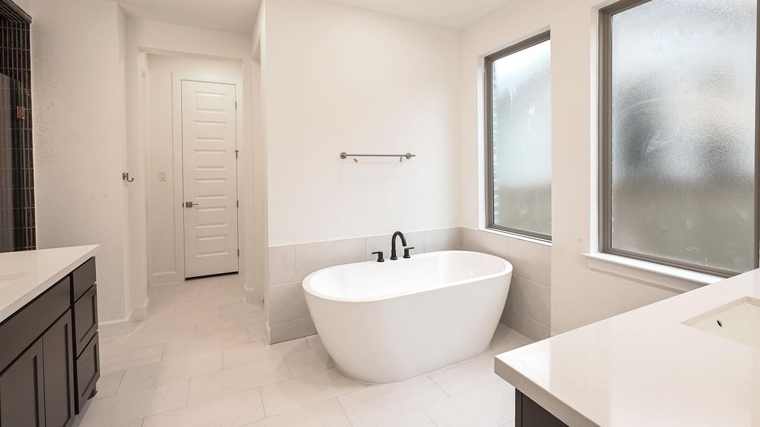 Furnished interior view inside a new home in Hidden Canyon 55', San Antonio (Image 9).