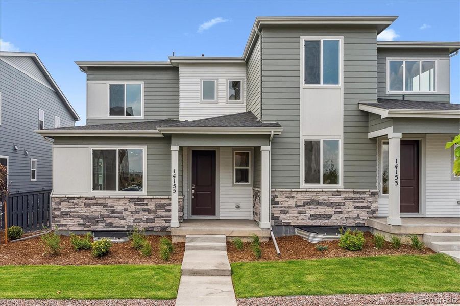 Front exterior of a new home in Paired Homes at Alder Creek, Parker, CO, highlighting curb appeal (Image 2).