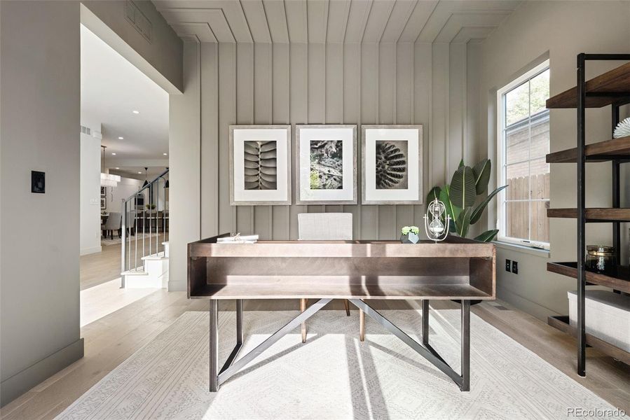 Main-floor office is separated from the main living space