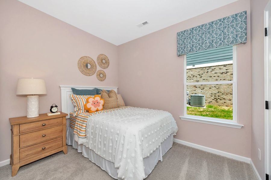 Representative furnished interior of a home built from the The Hampton by Smith Douglas Homes in La Segarra, Brookshire (Image 17).