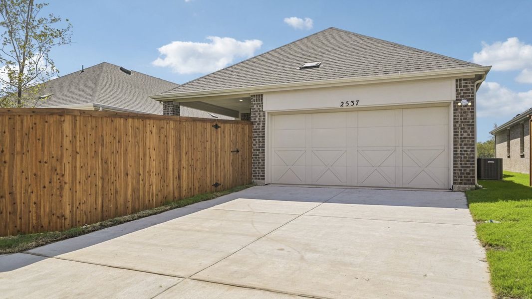 Exterior details and patio area of a home in Magnolia at Legacy Hills, Celina (Image 3). Exterior details and patio area of a home in Magnolia at Legacy Hills, Celina (Image 3).