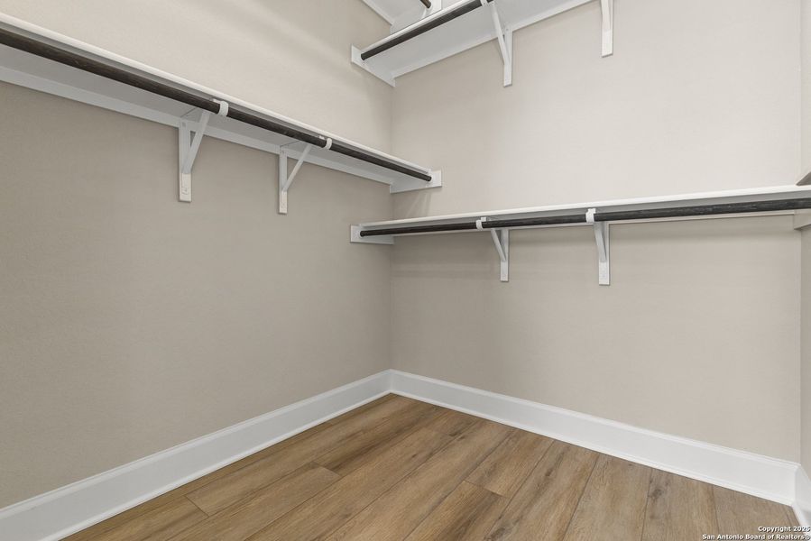 Spacious, unfurnished interior of a new home in The Enclave at Potranco Oaks, Castroville (Image 30).