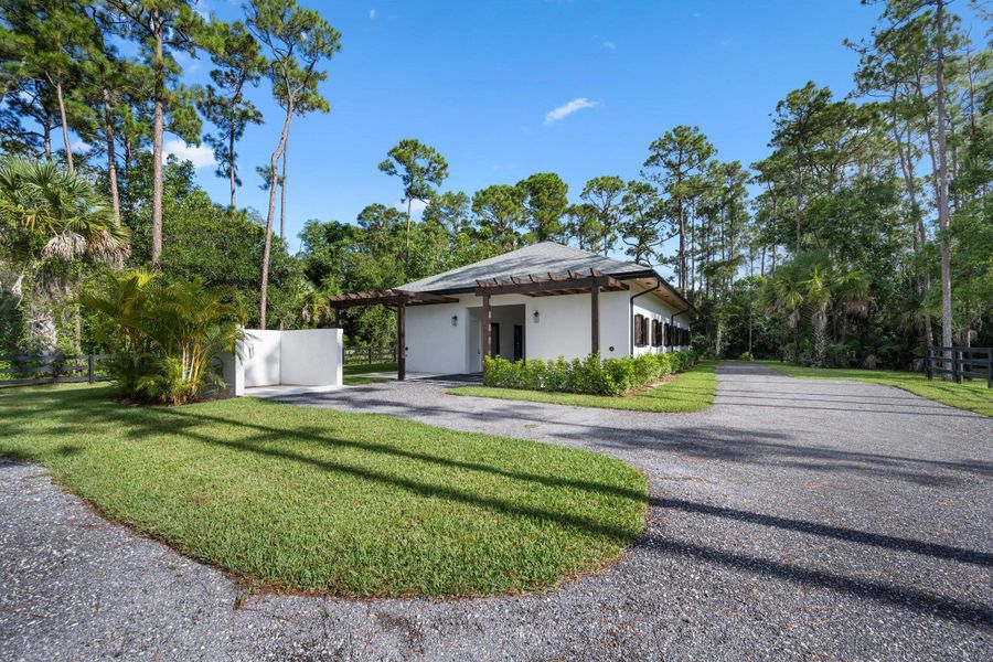 Front exterior of a new home in , Wellington, FL, highlighting curb appeal (Image 28).
