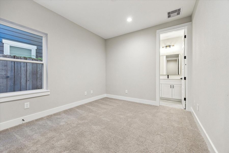 First floor bedroom functions well as guest suite