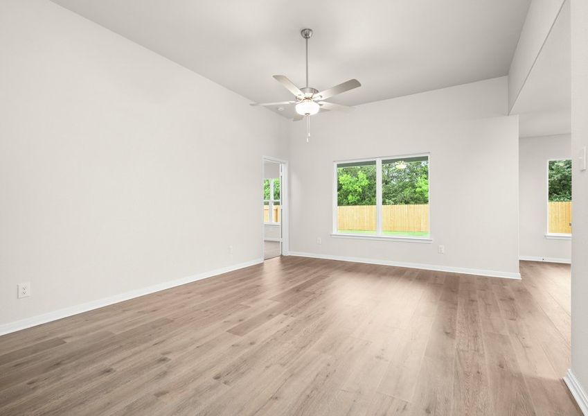 The family room has a large window that lets in great, natural light. The family room has a large window that lets in great, natural light.