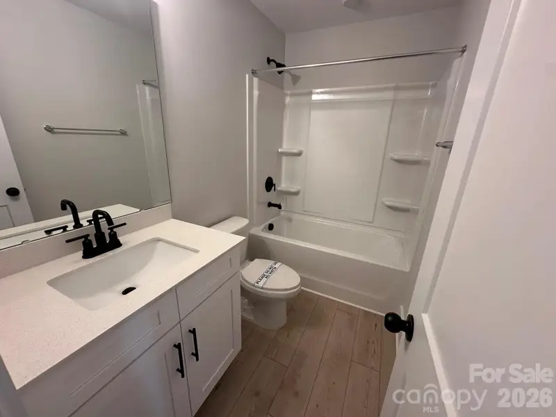 Furnished interior view inside a new home in Blythe Mill Townhomes, Waxhaw (Image 4).