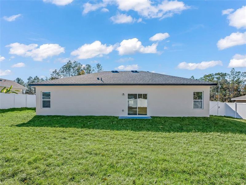 Exterior details and patio area of a home in , Ocala (Image 24).