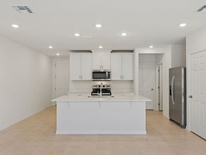 Furnished interior view inside a new home in The Meadow at Crossprairie Townes, St. Cloud (Image 3). Furnished interior view inside a new home in The Meadow at Crossprairie Townes, St. Cloud (Image 3).